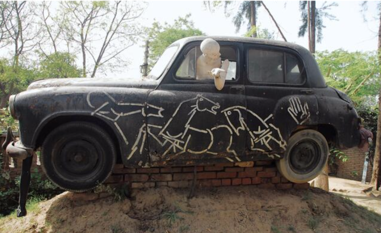 How Did M.F. Husain’s Passion for Cars Contrast with His Artistic Image?